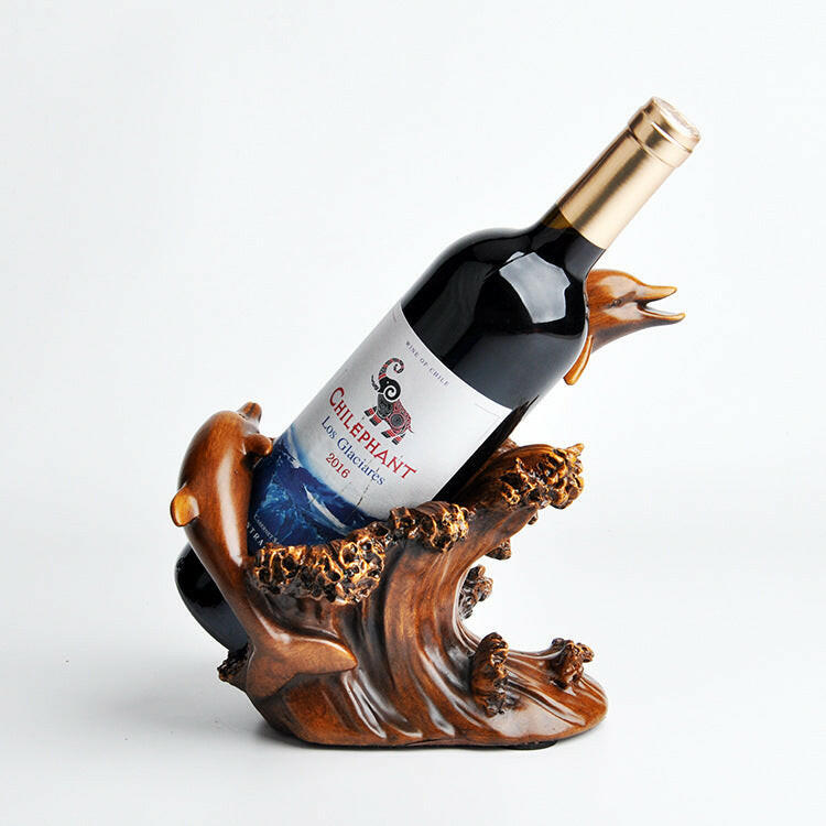 Wine bottle on a decorative wooden stand with a white background