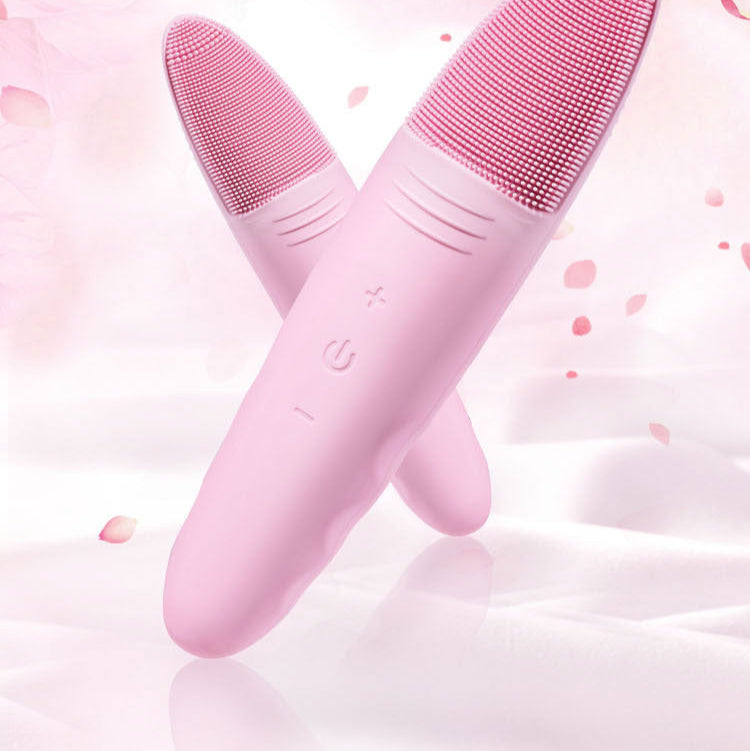Pink skincare device with text on a pink background