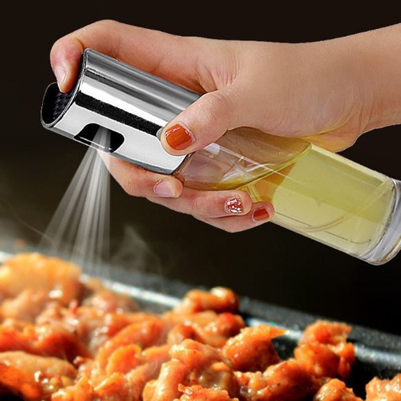 Hand using a salt shaker over food on a grill
