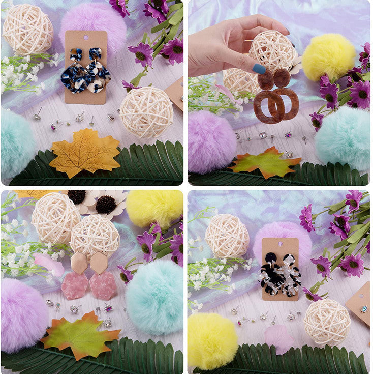 Collage of decorative items including earrings, pom-poms, and woven balls on a floral background.