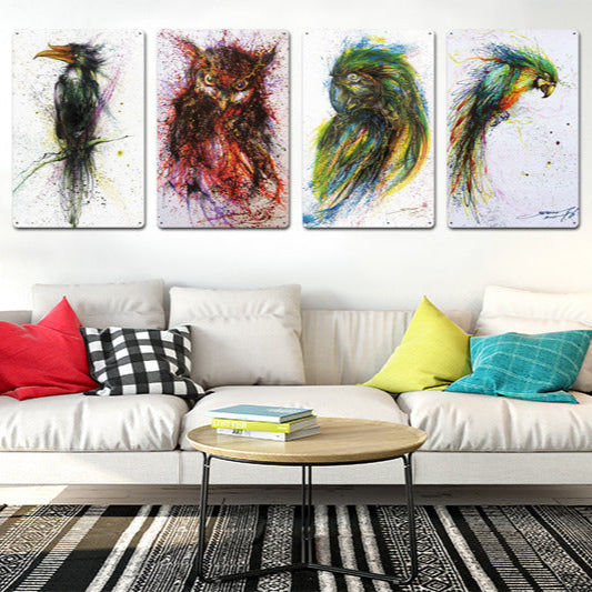 Living room with a white sofa, colorful cushions, and four abstract animal paintings on the wall.