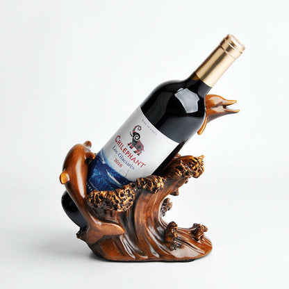Wine bottle on a decorative wooden stand with a white background