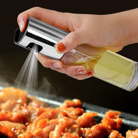 Hand using a salt shaker over food on a grill