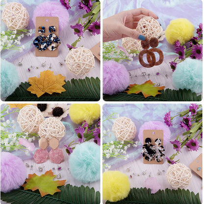 Collage of decorative items including earrings, pom-poms, and woven balls on a floral background.
