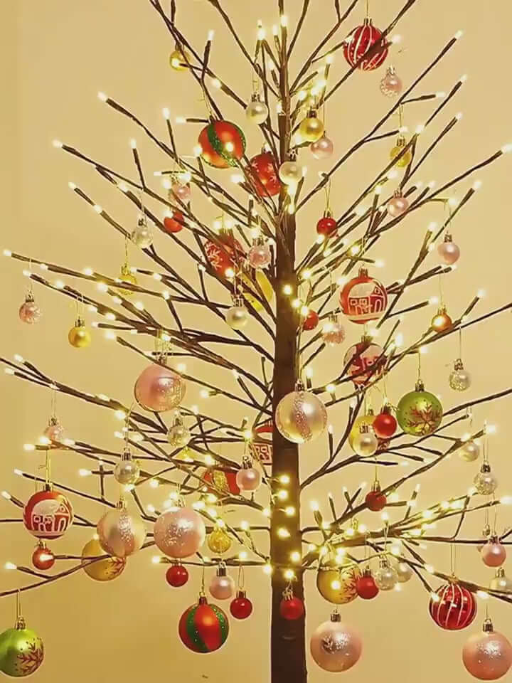 Colorful 6cm Christmas tree decorations on a beautifully lit holiday tree.