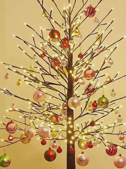 Colorful 6cm Christmas tree decorations on a beautifully lit holiday tree.